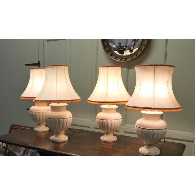 Set of 4 Ceramic Table Lamps with Linen Shades A superb large set of 20th century bulbous ceramic table lamps All in good...
