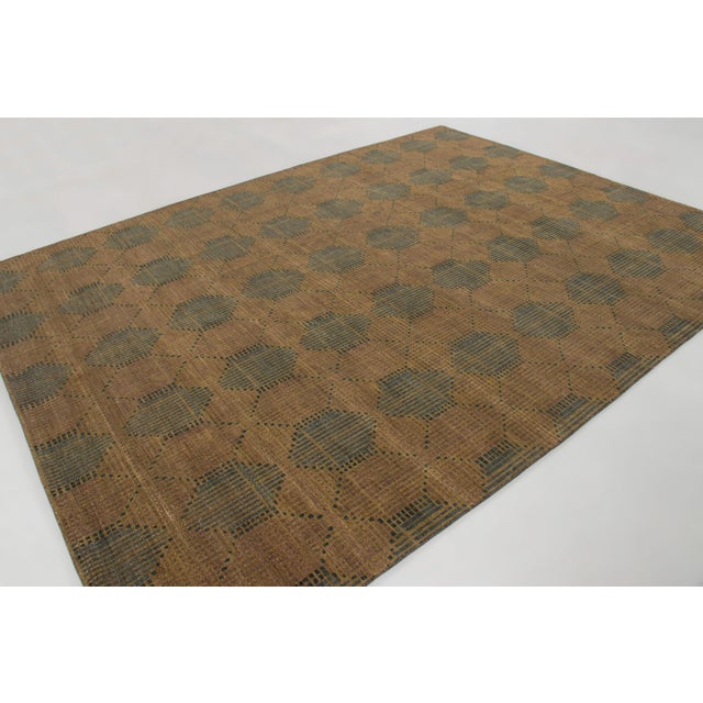 Hand-knotted in wool, this 9x12 contemporary rug joins Rug & Kilim’s Modern collection. It features an all-over grid...