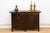 A sophisticated study in contrast and storytelling, "The Gilded Province" is an exceptional antique sideboard featuring...
