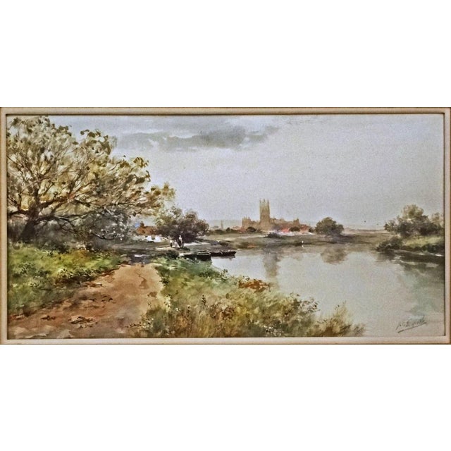 Serene river landscape watercolor painting signed lower right "F. F. English," the signature of Frank F. English...