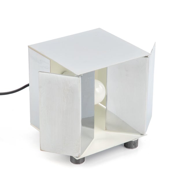 The Kinetic 3H chrome table lamp, designed by Paolo Tilche for Sirrah, was produced in Italy during the 1970s. The design...