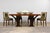 A refined set of six French Art Deco dining chairs, sourced in Paris and dating to the 1930s. The chairs are attributed to...