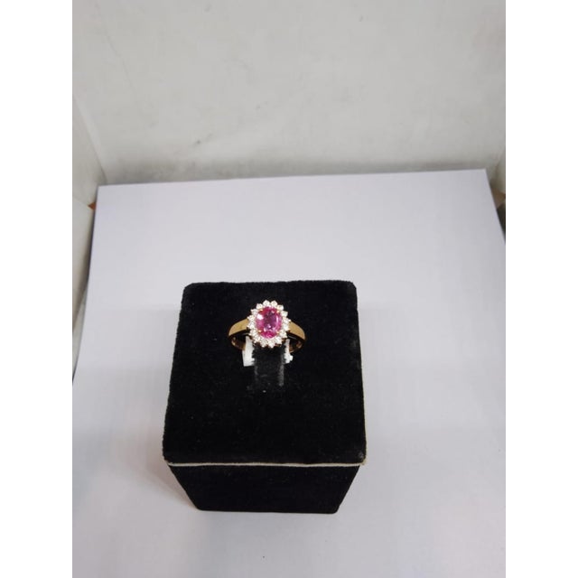 Gemstone details Gold Purity: 18K Solid Gold Pink sapphire: 1.47 cts Diamond: 0.29 cts 18K gold Net weight: 3.08 grams...