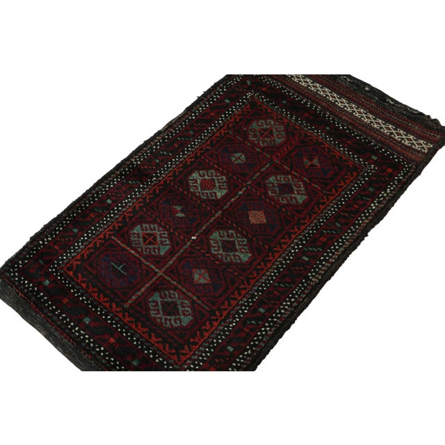 Hand knotted in wool, this 2x4 Baluch rug represents a new line of tribal carpets in the Modern Classics Collection by Rug...