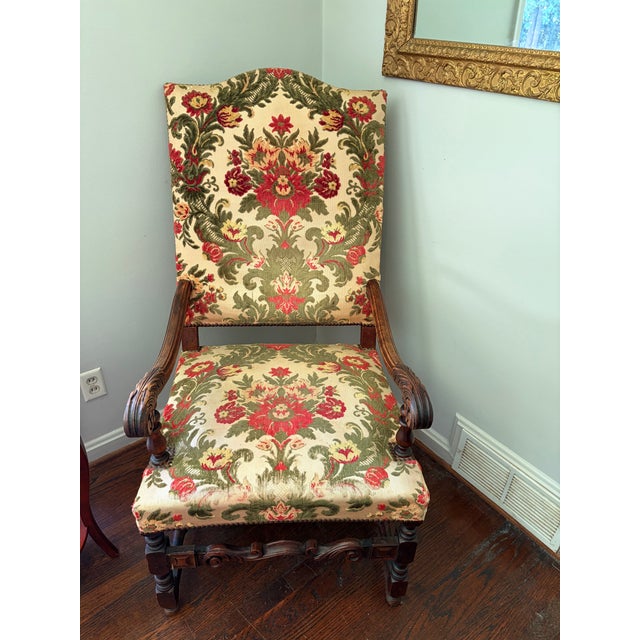 This exceptional pair of matching high-back throne armchairs beautifully embodies the grandeur and architectural rigor of...