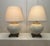 There's a transitional classic minimalism along with subtle Asian inspiration to this pair of table lamps. Each lamp...
