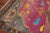One of a kind whimsical Turkish Animal Human figurative Motif on a fuchsia ground. This rug is from the middle of the 20th...