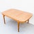 Restored 1950s blonde mahogany dining table with two leaf extensions by Brown Saltman. With a maximum length of over 100...