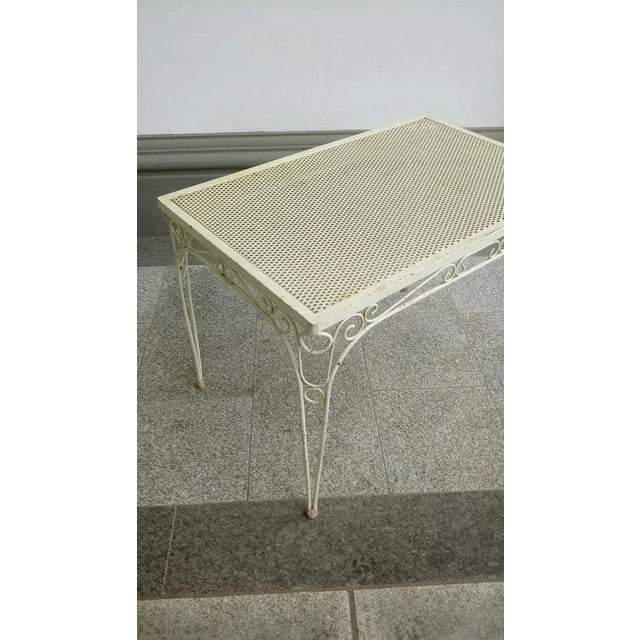 Decorative metal table in good used condition. Dimensions: width 100 cm x depth: 65 cm x height: 70cm