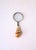 A metal magnifying glass with seashell handle, circa early to mid-20th century. Piece has a metal frame with what appears...