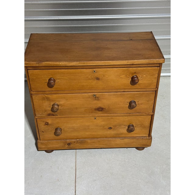 Antique Pine Three Drawers - Chest of Drawers From England We like how the darker knobs on this chest of drawers really...