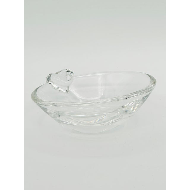 A petite form of the classic Steuben art glass ashtray with a single applied notch, perfect for individual use as intended...