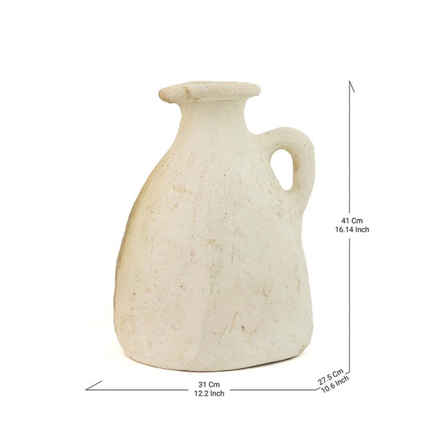 Unique and handcrafted, this Tamegroute carafe combines white, terracotta, and subtle green hues, a testament to kiln...