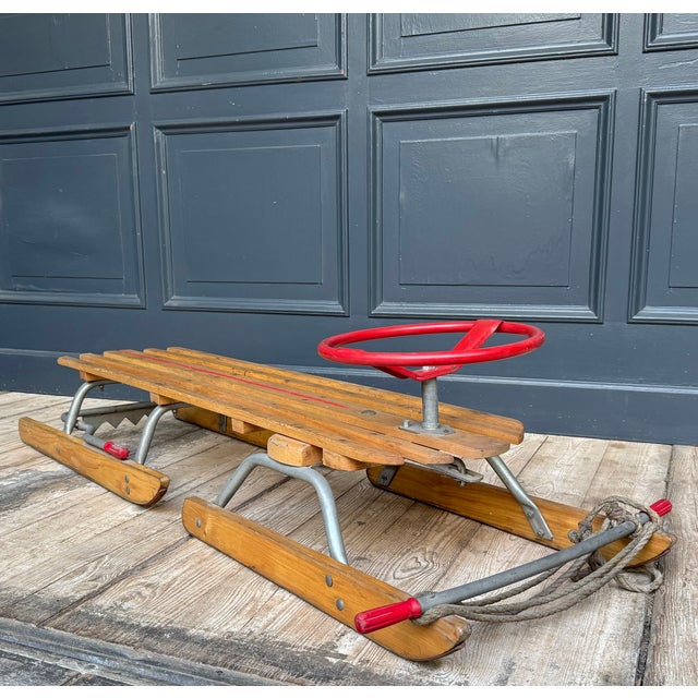Original vintage steering sledge or steering toboggan. This sledge, often referred to as a bobsleigh, features two...