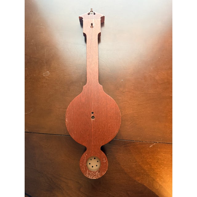 A classic mid-century aneroid home barometer produced by the renowned Swift Instruments Inc. of Boston, Mass. Known...