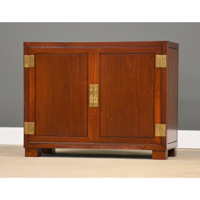 A modern solid mahogany two drawer and two door credenza chest. Very well made similar to Henredon or Baker. Photoed are...
