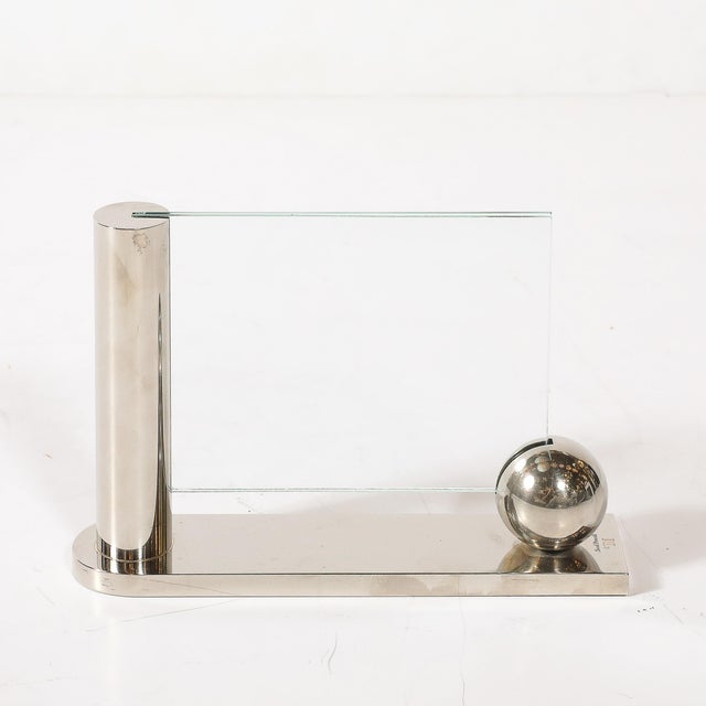 This Swid Powell silver-plated picture frame, created in the United States around 1980, is a striking example of modernist...