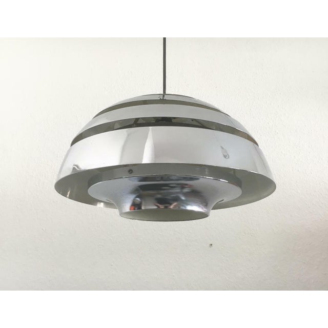Rare Mid Century Dome pendant lamp with slats in chrome -colored surface. The lamp is often attributed to Hans-Agne...