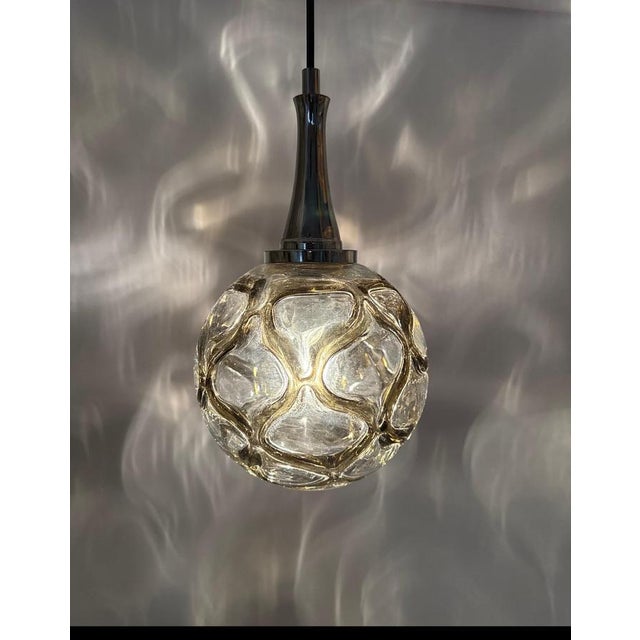 Beautiful handcrafted pendant lamp by Doria. This lamp is timelessly beautiful, the mouth-blown glass was made by master...
