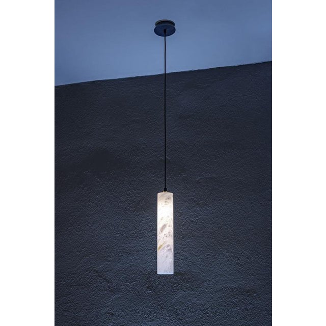 Tubular bells pendant lamp by united alabaster dimensions: ⌀ 7,8 x h 39 cm materials: alabaster, copper (matt black...