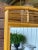 Adorable vintage Coastal rattan mirror with wicker inset at the bottom. Cute piece for over a small chest as an accent...
