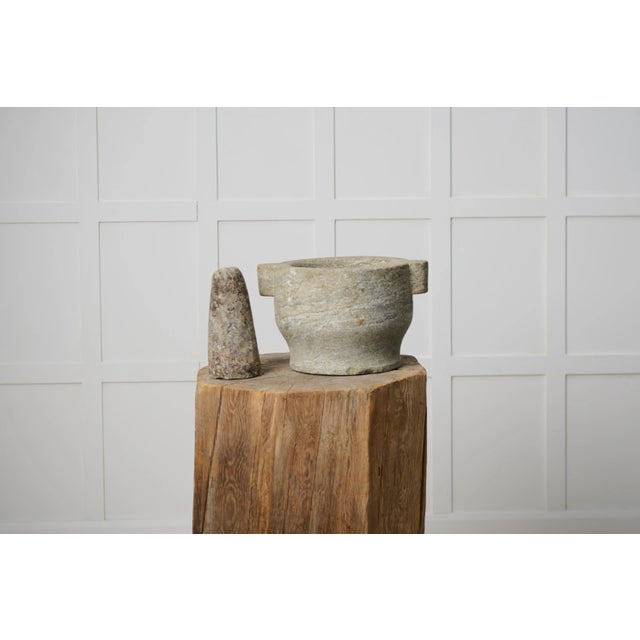 Unusually large antique mortar from Sweden. The mortar is made by hand in stone and is solid and heavy. Made in Sweden...