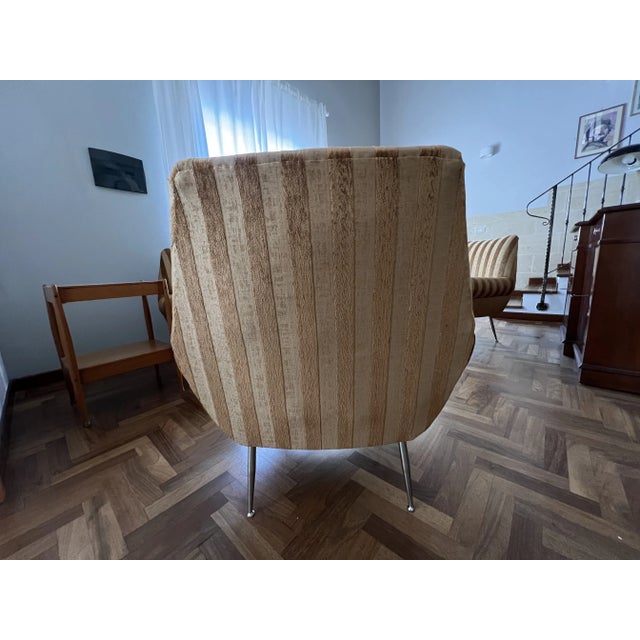 Pair of armchairs and curved sofa designed by Gigi Radice for Minotti. They are made with a solid wood structure and light...