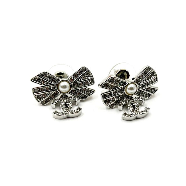 Chanel Chanel Silver Ribbon Row CC Crystal Piercing Earrings - 2 Pieces For Sale - Image 4 of 4