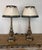 A magnificent and highly decorative pair of vintage Italian Baroque table lamps, rendered as monumental twisted...