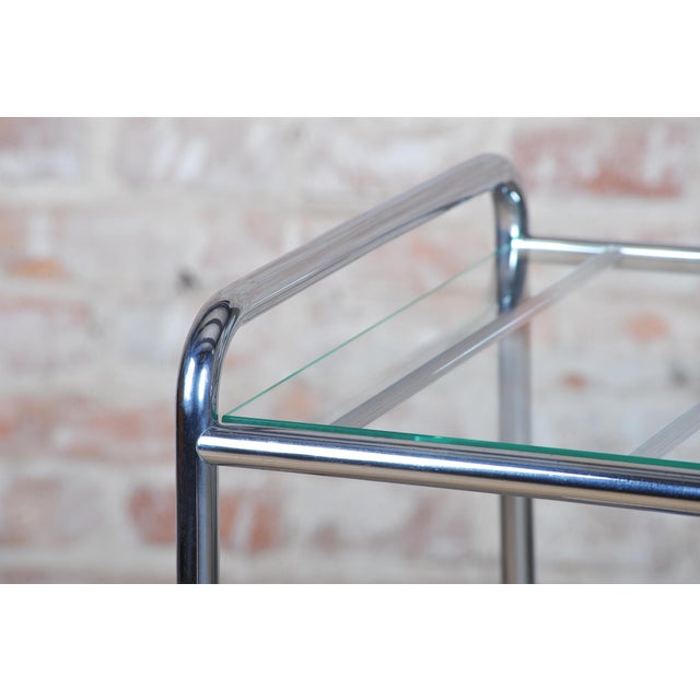This cleanly shaped and visually light small table in the spirit of Bauhaus functionalism dates from the 1930s in...