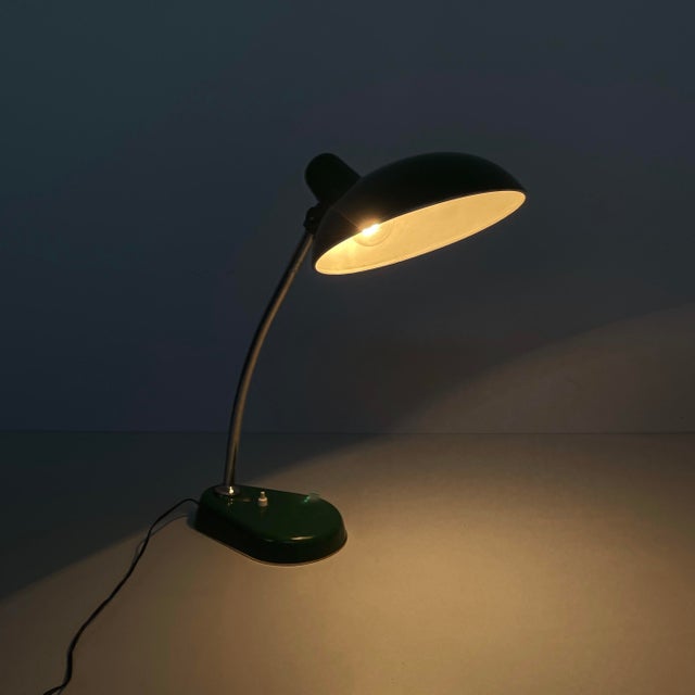 Italian mid-century modern adjustable table lamp in green metal, 1950s Table lamp with adjustable lampshade in metal...