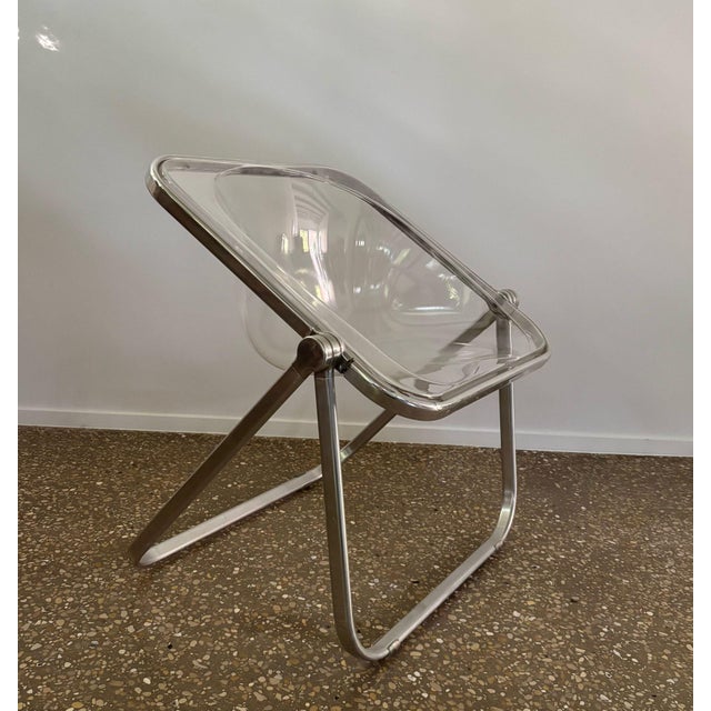 This iconic so called 'plona' chair was designed by giancarlo piretti in 1970 and produced by castelli. The chair is...