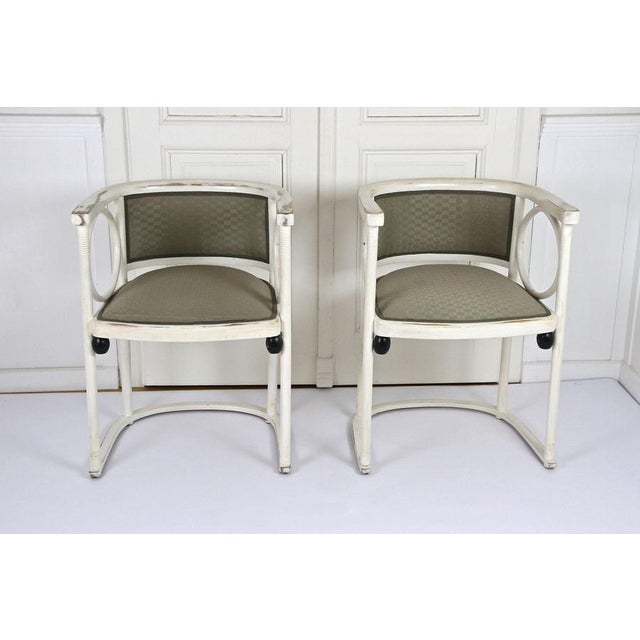 Outstanding pair of white lacquered Art Nouveau Thonet armchairs from the period around 1905 in Austria. The timeless...