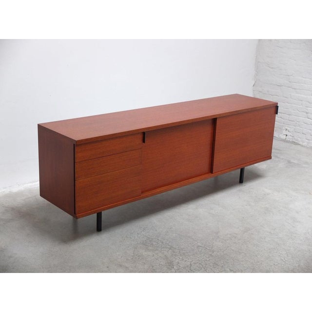 Stunning sideboard designed by Hans Konëcke for Tecta circa 1960. A very sleek and minimalistic design with two sliding...