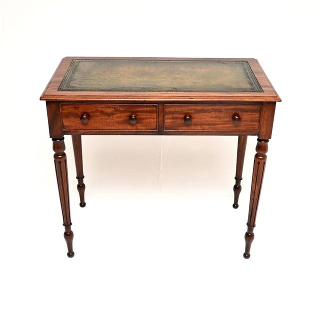 A wonderful antique William IV period leather top writing table / desk. This was made in England, it dates from around the...