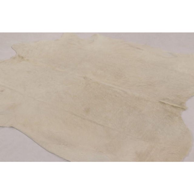 This handmade 7x7 contemporary cowhide rug from Rug & Kilim represents an exciting new collection of rare large-size...