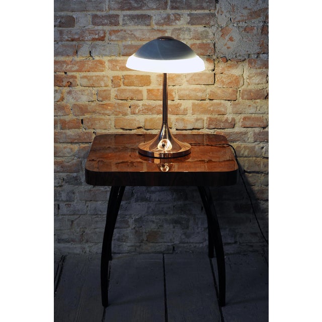 Socket: 2 x E27 This shape-captivating and elegant desk lamp in the distinct Art Deco style dates from the 1930s in...