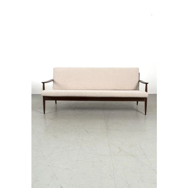 Elegant carl straub goldfeder lounge sofa from 1950 made in germany. The cushions have been reupholstered with a beautiful...