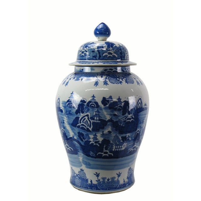 This gorgeous large blue and white porcelain jar is adorned with beautifully hand painted houses, pagodas, arched bridges,...