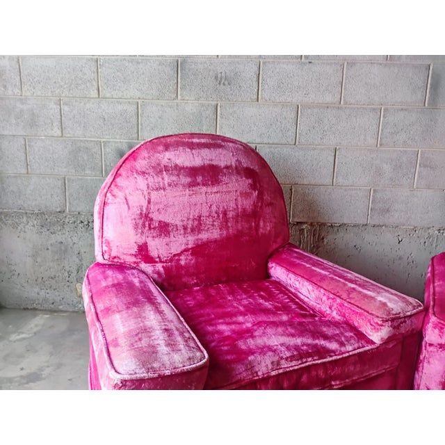 Elevate your living space with this set of two vintage pink crushed velvet armchairs. Luxurious, plush, and eye-catching,...