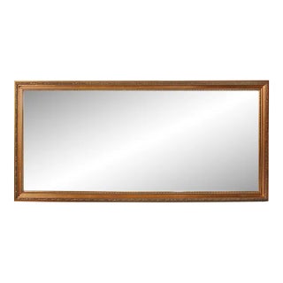 Vintage Large Handcarved Gilt Beveled Mirror With Patina For Sale