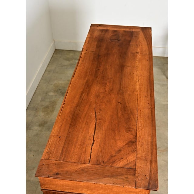 A beautiful, solid walnut enfilade from the 19th century, Louis Philippe period. The top surface is simply constructed in...