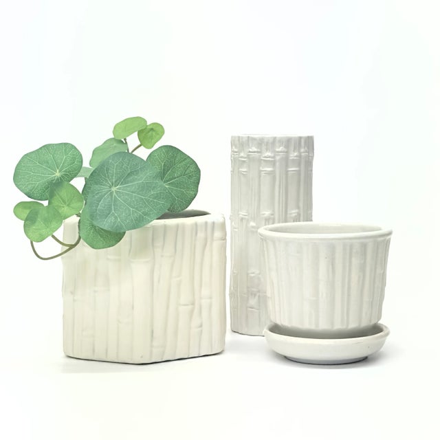 White bamboo ceramic planters, group of 3. This set of art deco planters are in a cream or antique white color, featuring...