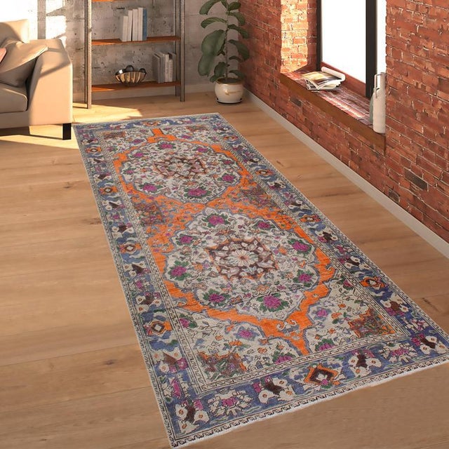 Enhance your living space with this stunning vintage Persian hand-knotted wool rug, a true showstopper that effortlessly...