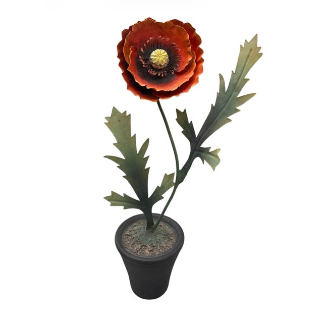 This charming vintage decorative accent features a single, oversized red poppy crafted from metal with an impressive level...