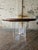A stunning walnut and acrylic dining table by Vladimir Kagan with two leaves and drop-down acrylic support legs, used when...