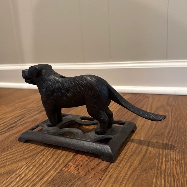Vintage Cast Iron Black Dog Nutcracker. Use as a door stop, bookend, or display item.