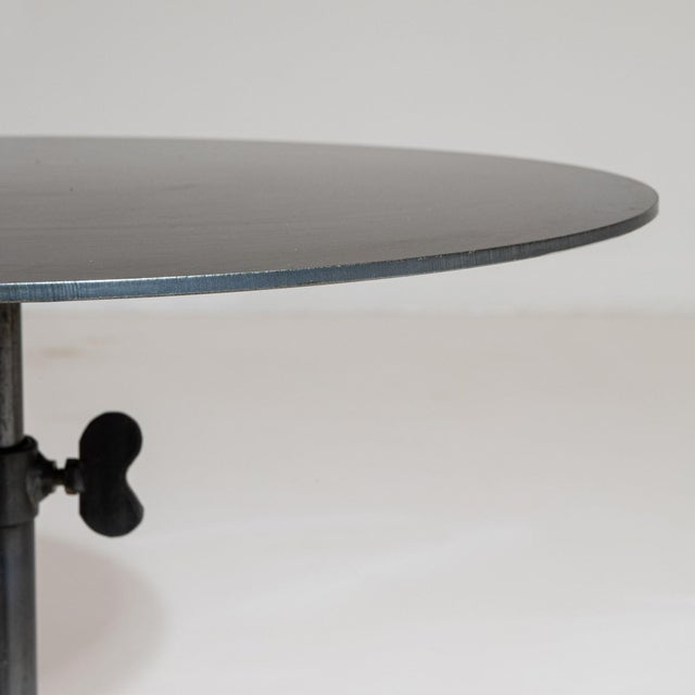 Round stone-base side table in Deep Charcoal Grey. Finished in deep charcoal grey, this round stone-base side table is...