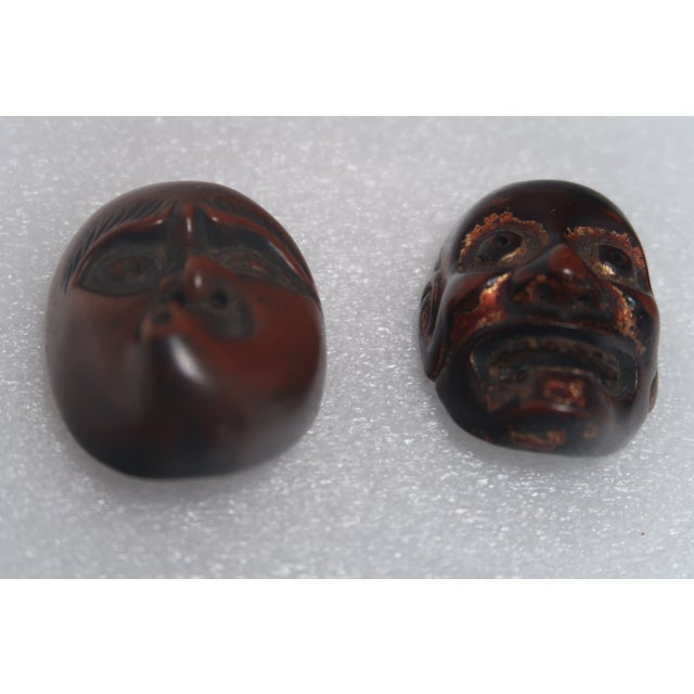 Very special antique wood well-carved and clearly signed netsukes. One still has the excellent gold polychrome...