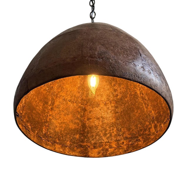 Vintage iron pendant light crafted from a hand-forged bowl from early–mid 20th century India. Such vessels were...